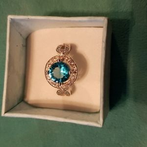 925 Silver lab created blue topaz and white topaz ring.